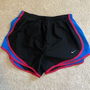Black, blue and pink Nike shorts